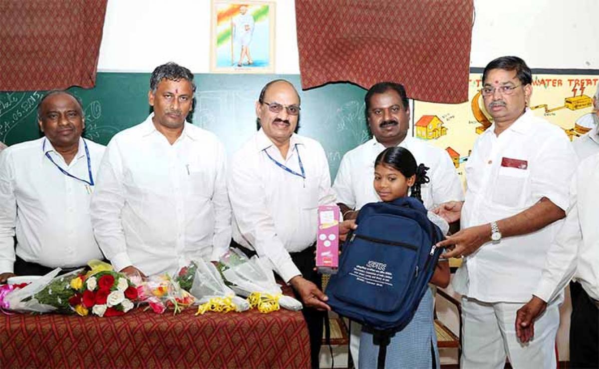 ECIL distributes bags to govt school